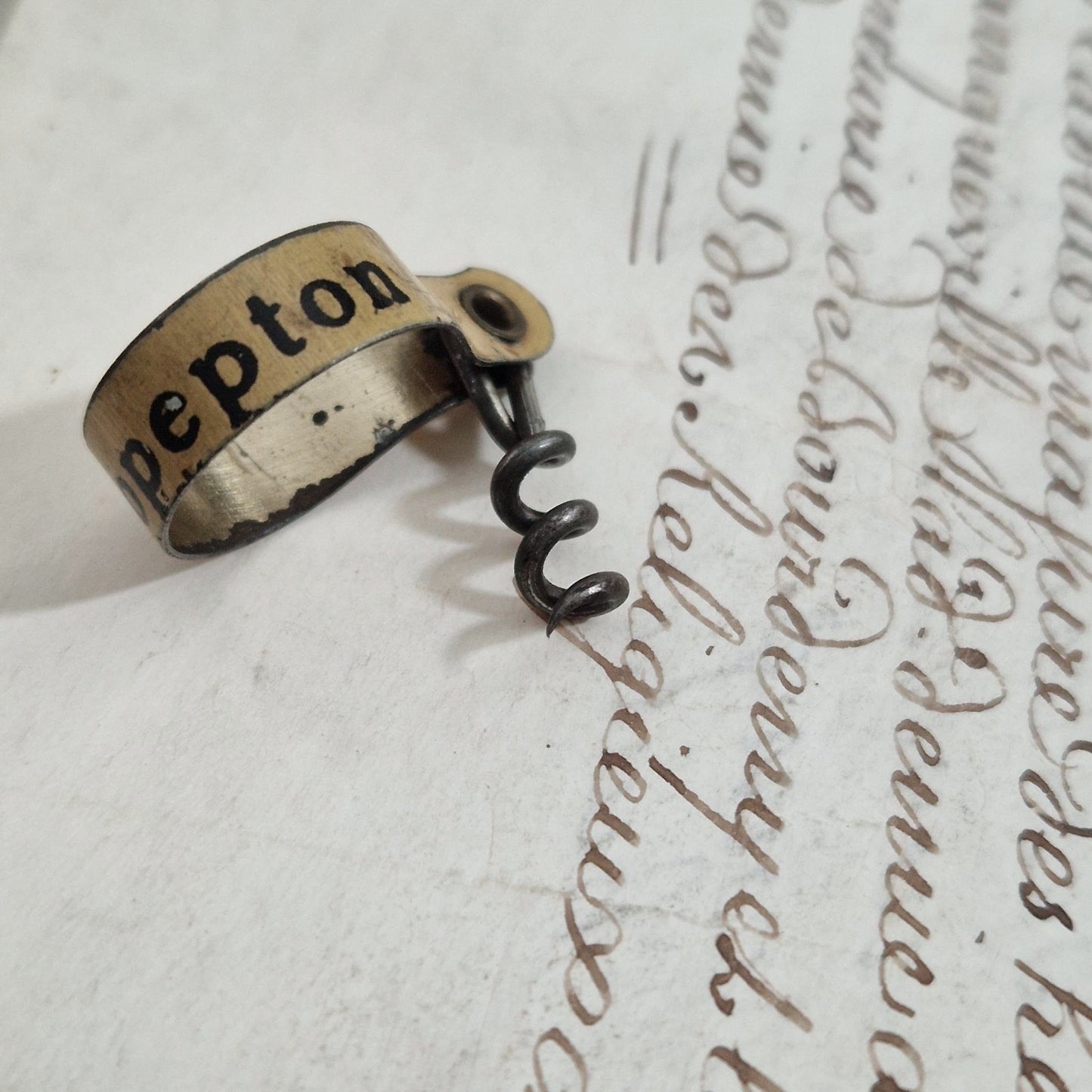 Mini tire-bouchon publicitaire pliable - Début XXe