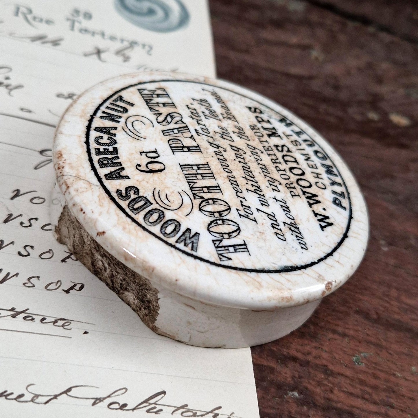 Antique lid for "Woods Areca Nut Tooth Paste"