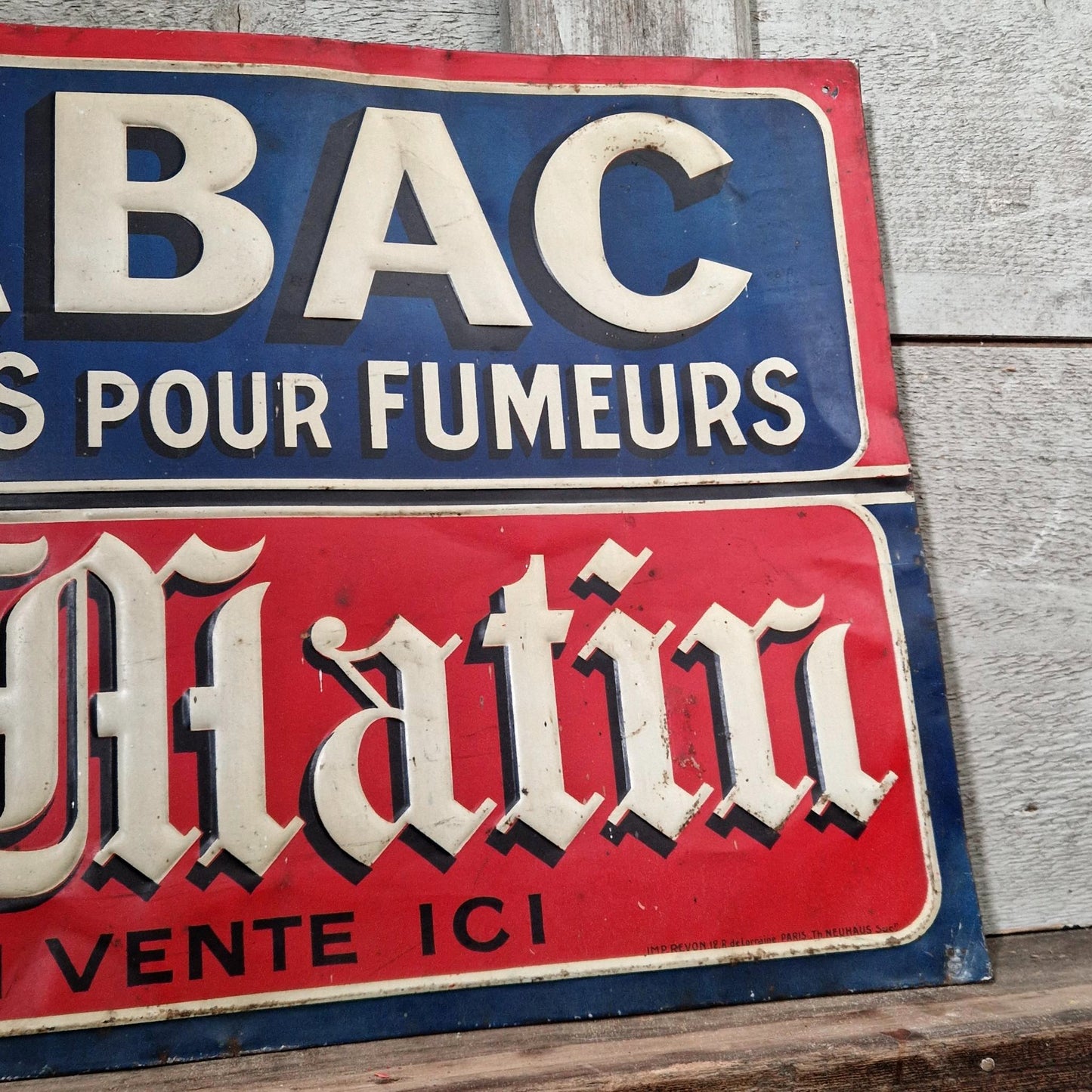 Large advertising sign "Tobacco / Le Matin"
