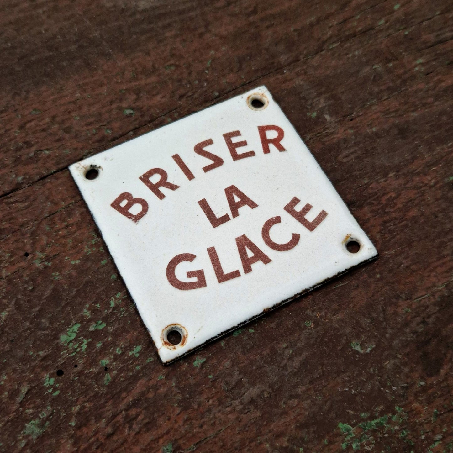 Ancienne plaque émaillée « Briser la glace »