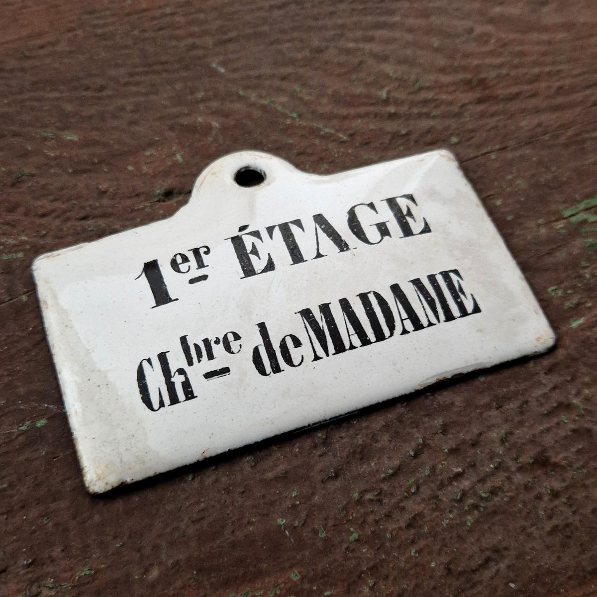 Enamel sign “Madam’s Room – 1st floor”
