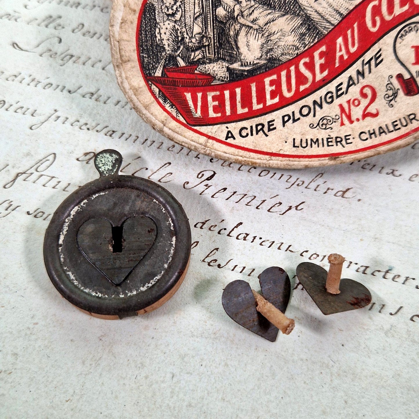 antique night light tin heart shape