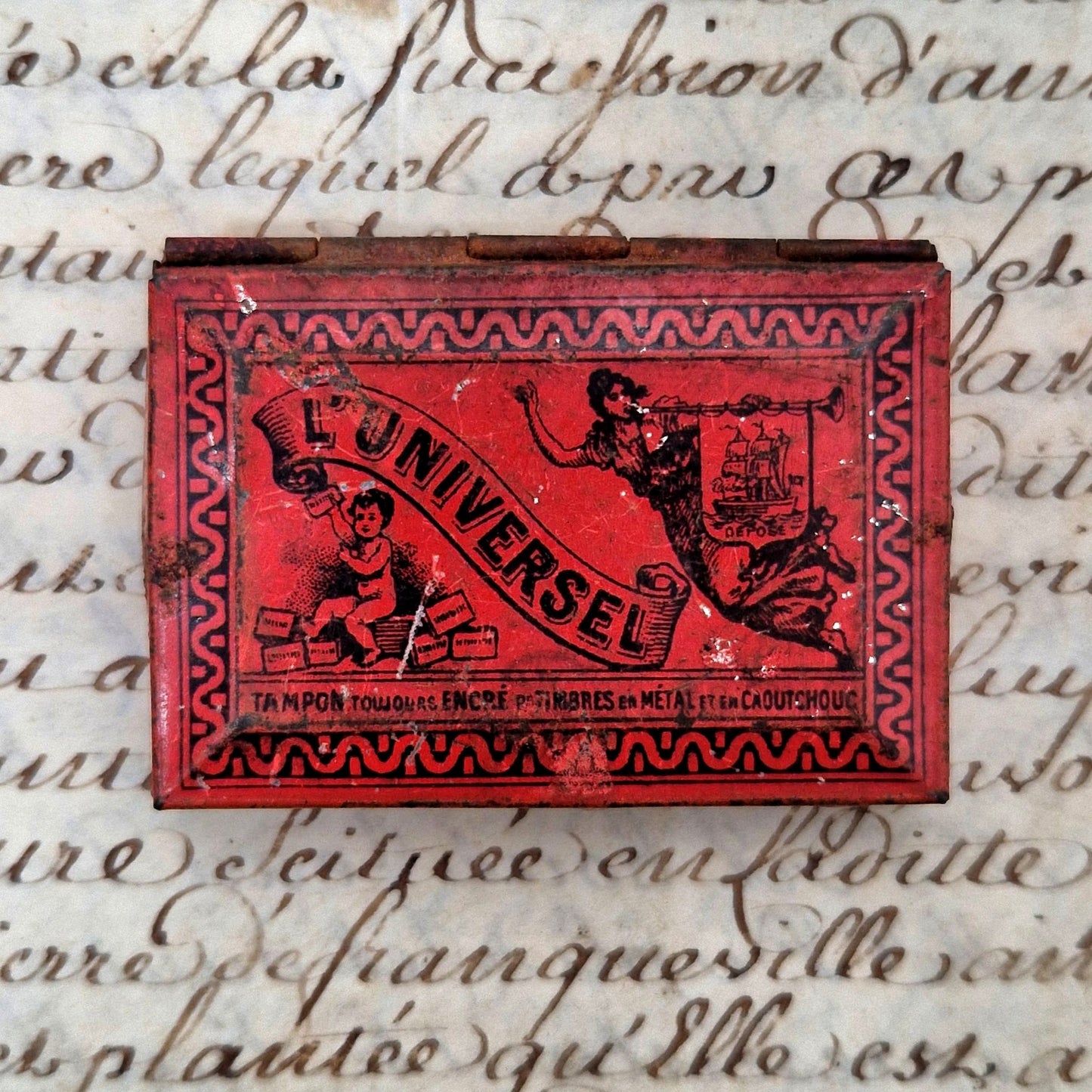 boite ancienne tampon encre l'universel