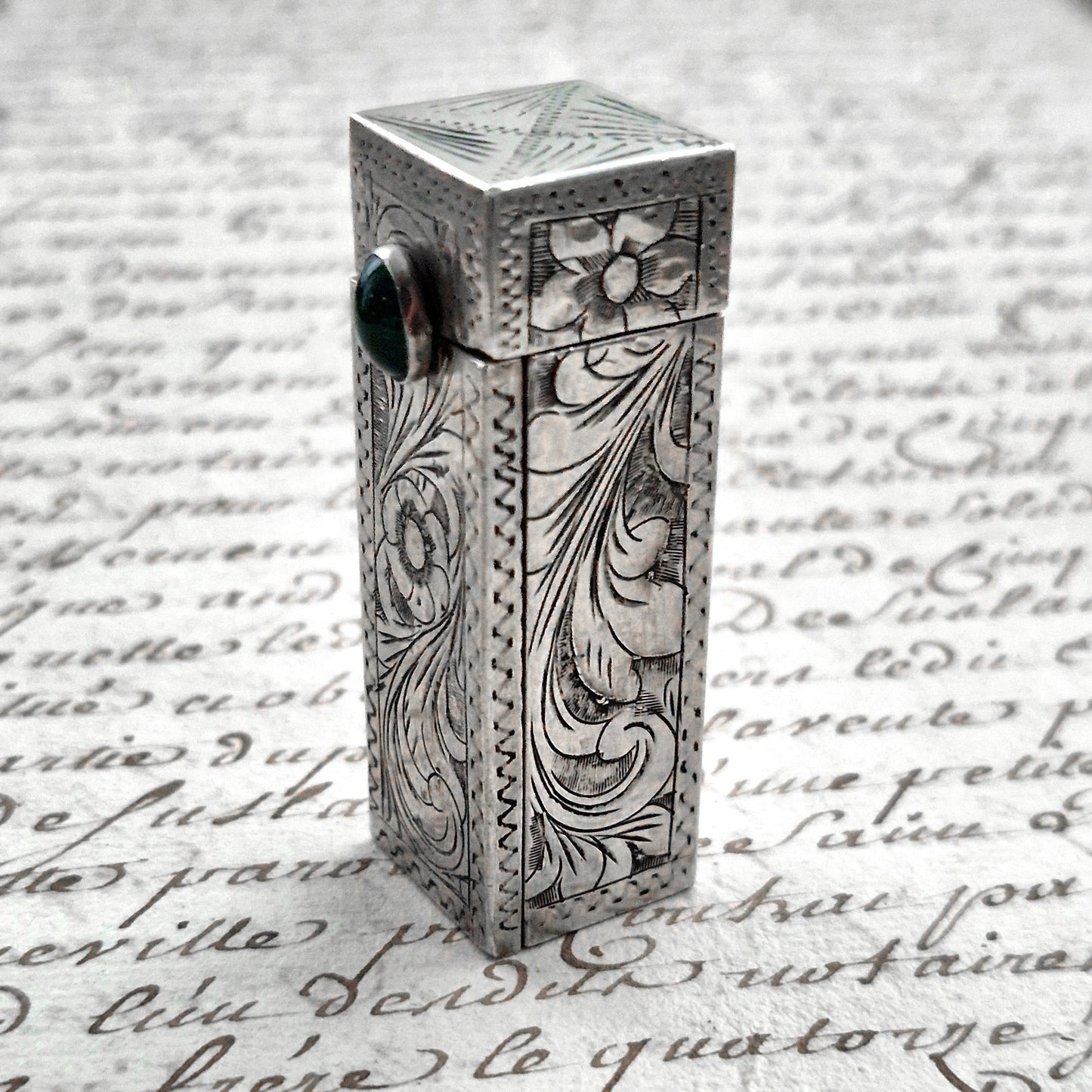 emerald glass lipstick holder