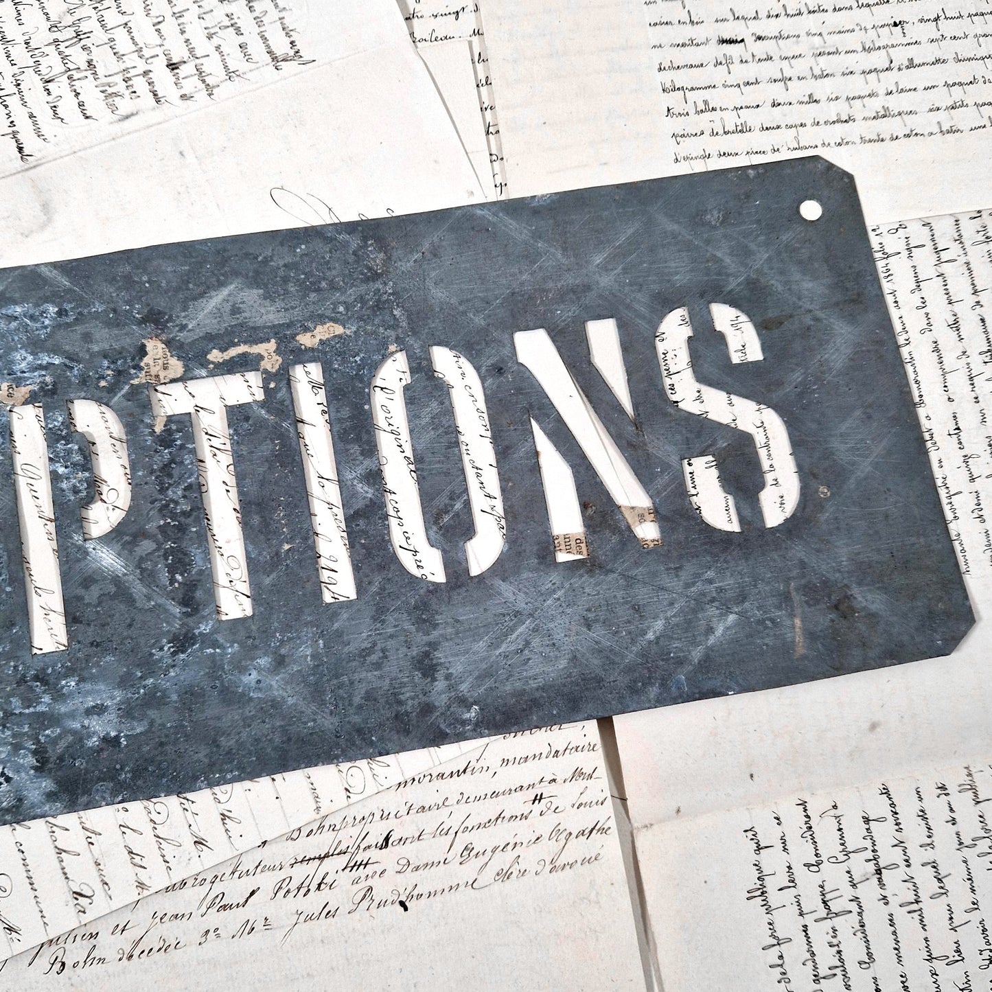 old metal stencil inscriptions