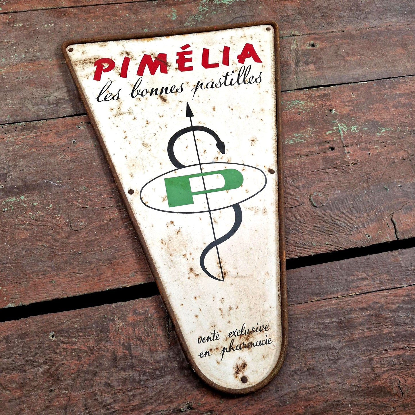 vintage pimelia pharmacy enamel sign