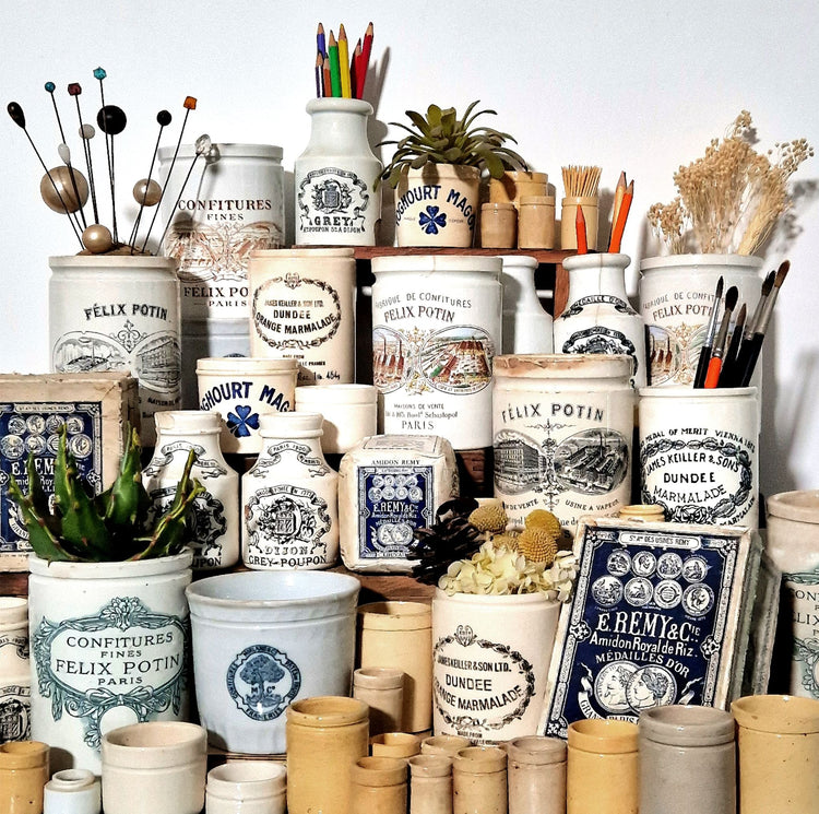 Anciens pots en céramique publicitaires