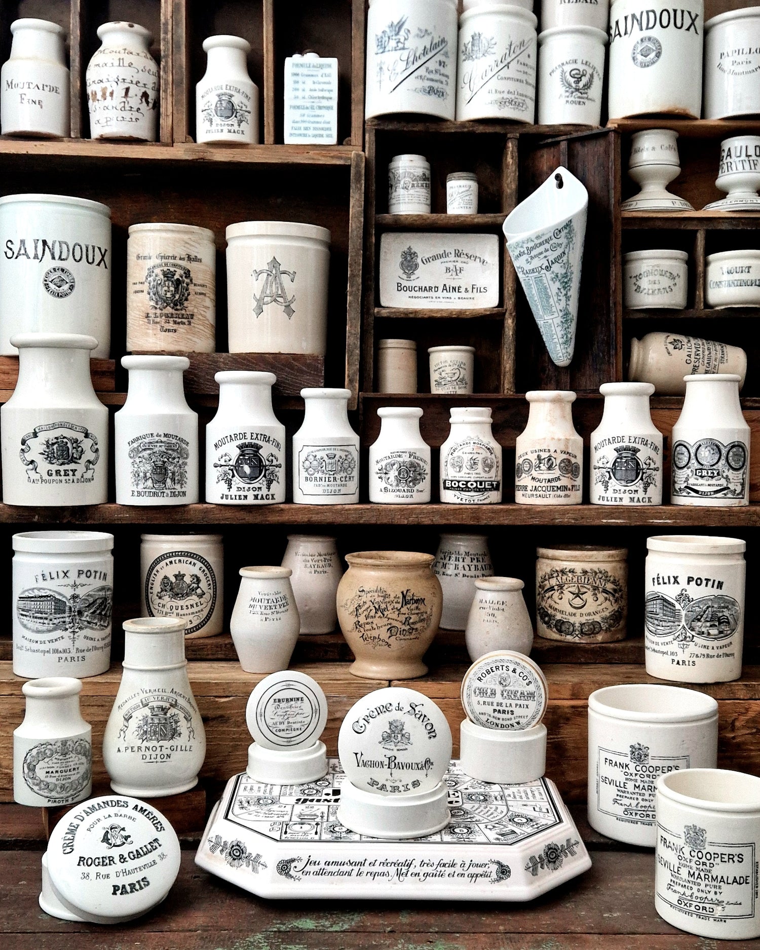 Anciens pots en céramique publicitaires