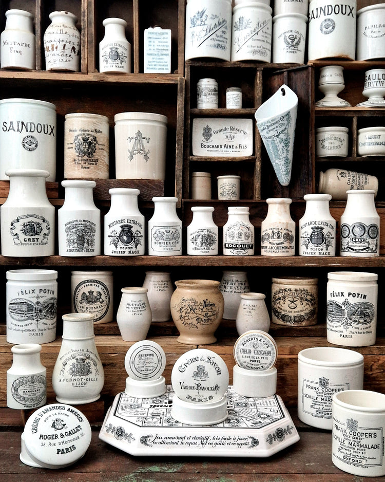Anciens pots en céramique publicitaires