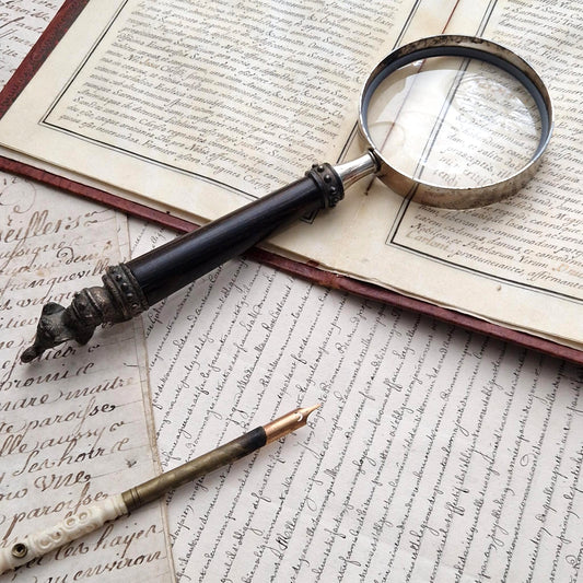 Large magnifying glass - exotic wood handle, elephant finial