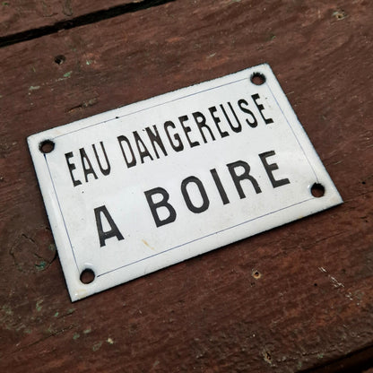 Black enamel sign "Water dangerous to drink"