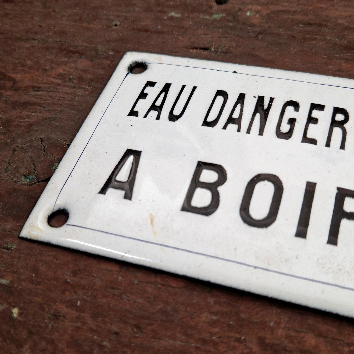 Black enamel sign "Water dangerous to drink"