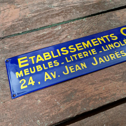 Plaque émaillée « Établissements Gaston – Meubles, literie... »