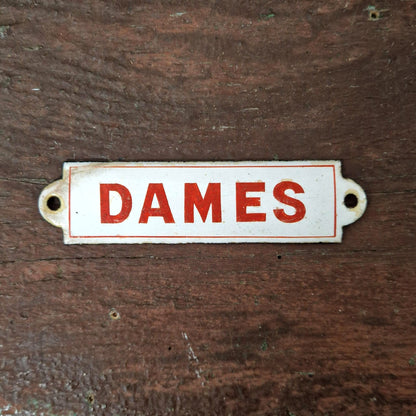 Red enamel sign "LADIES"