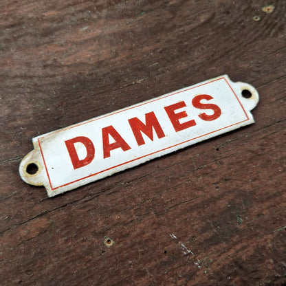 Red enamel sign "LADIES"