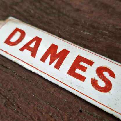 Red enamel sign "LADIES"