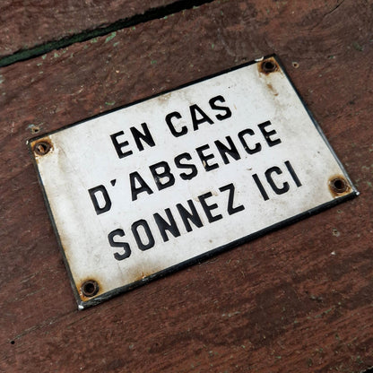 Enamel sign: "If no one is home, ring here"
