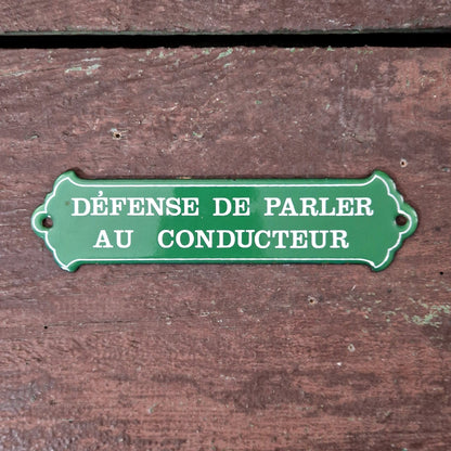 Enamel sign: "No talking to the driver"