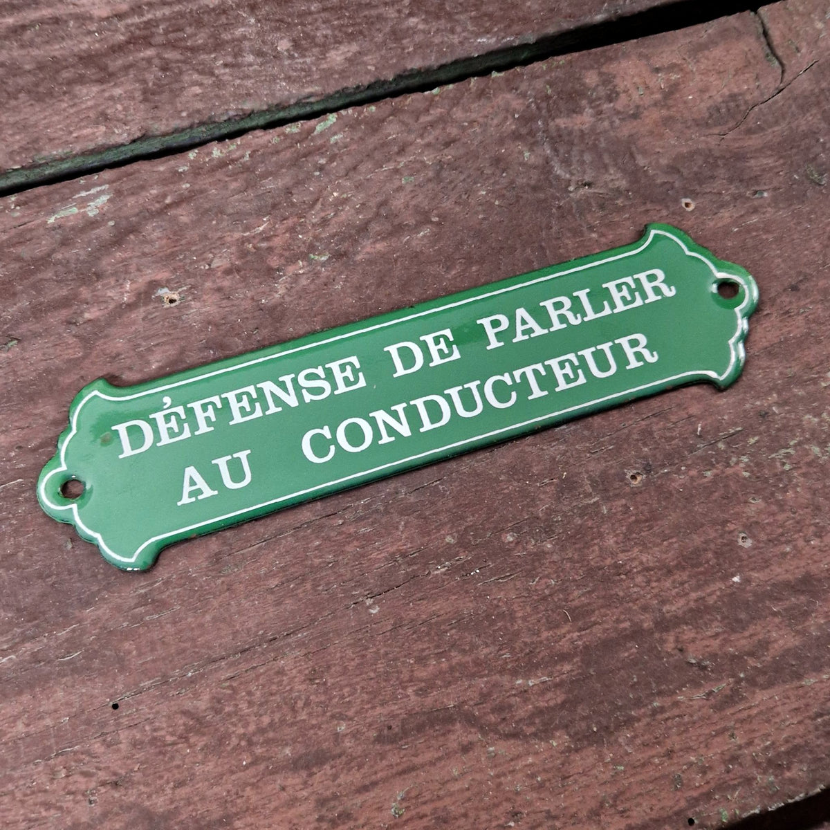 Enamel sign: "No talking to the driver"