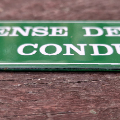 Enamel sign: "No talking to the driver"