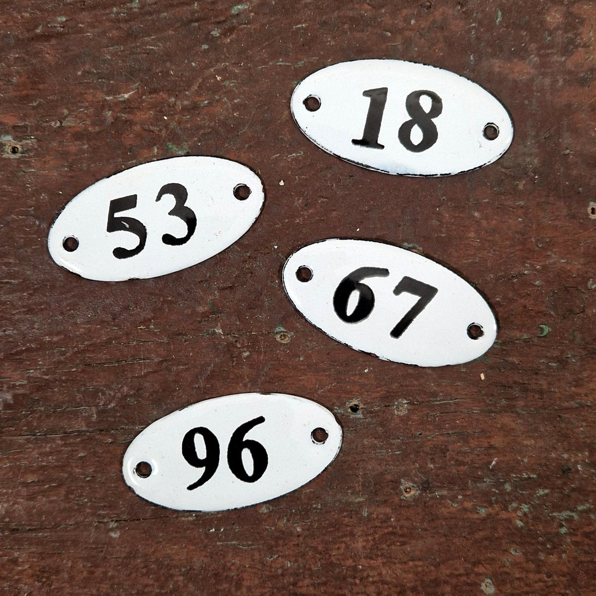 Numbered oval enamel plaque