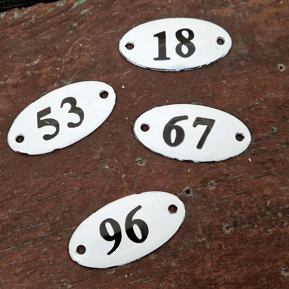 Numbered oval enamel plaque