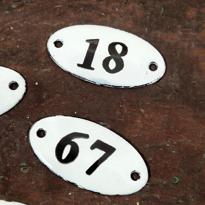 Numbered oval enamel plaque