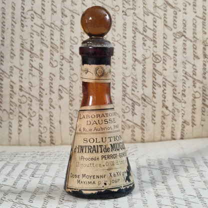 Ancien Flacon conique « Intrait de Muguet » entamé