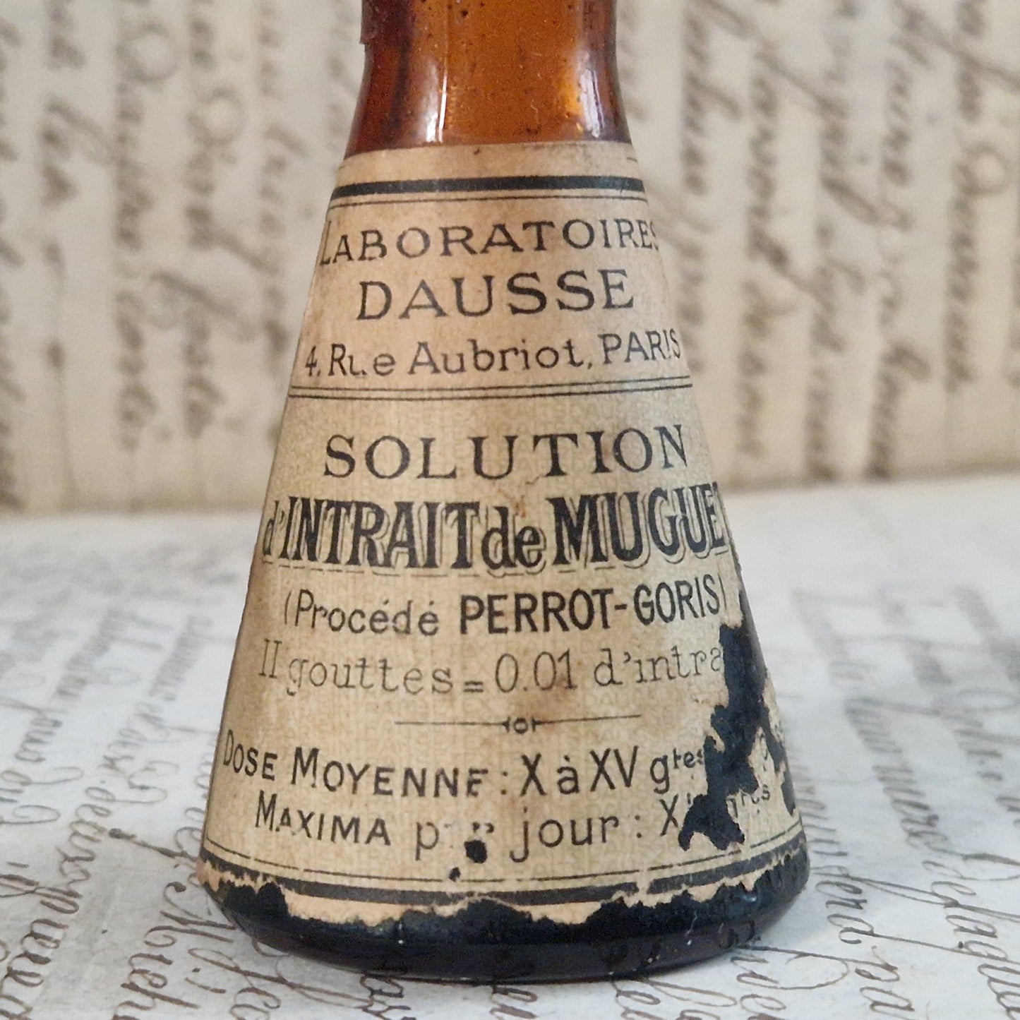 Ancien Flacon conique « Intrait de Muguet » entamé