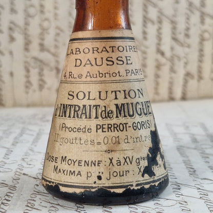 Ancien Flacon conique « Intrait de Muguet » entamé
