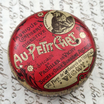 Rare "Au Petit Chat" advertising tin, Vichy pastilles