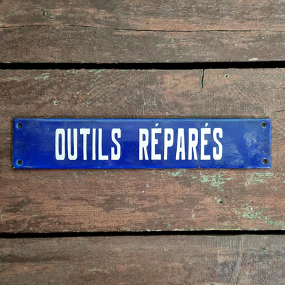 Ancienne plaque émaillée « Outils réparés »