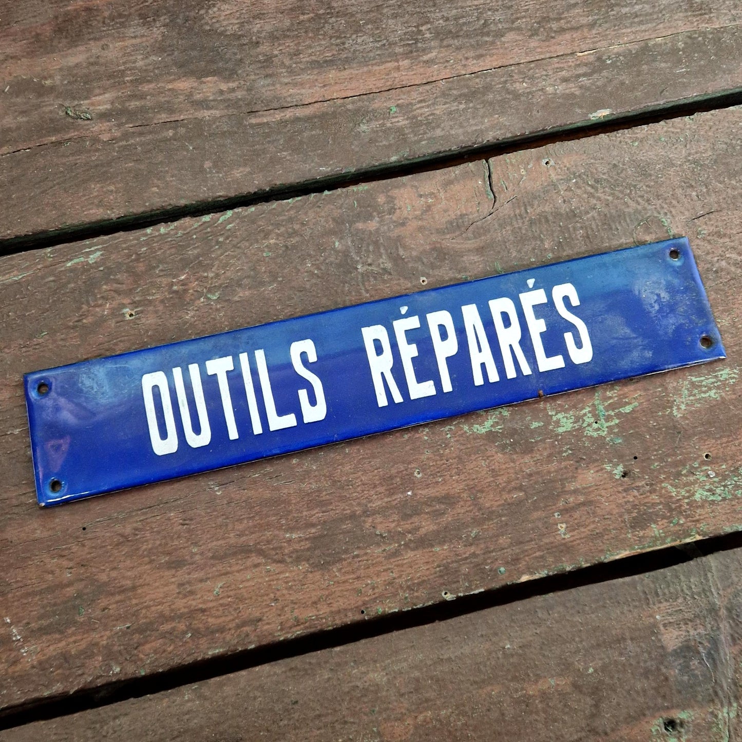 Ancienne plaque émaillée « Outils réparés »