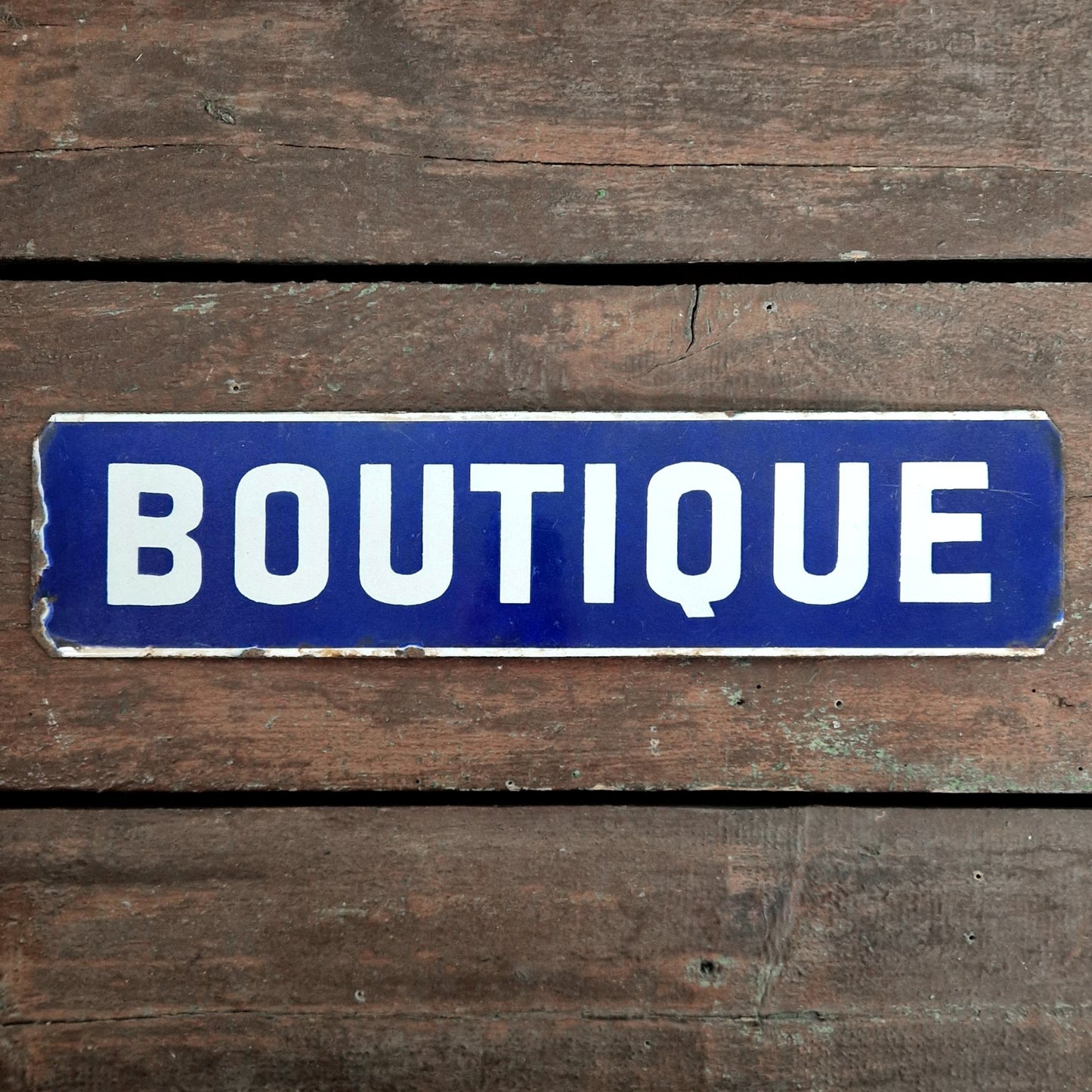 Ancienne plaque émaillée « Boutique »