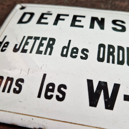 Plaque « Défense de jeter ... dans les W-C »