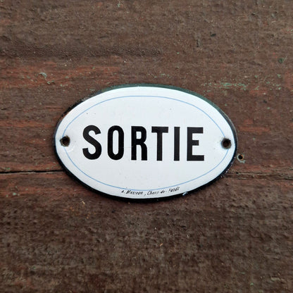 Charmante plaque émaillée « SORTIE »