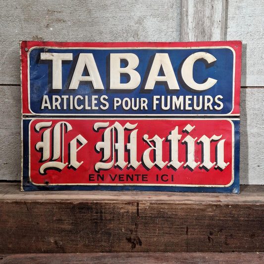 Large advertising sign "Tobacco / Le Matin"