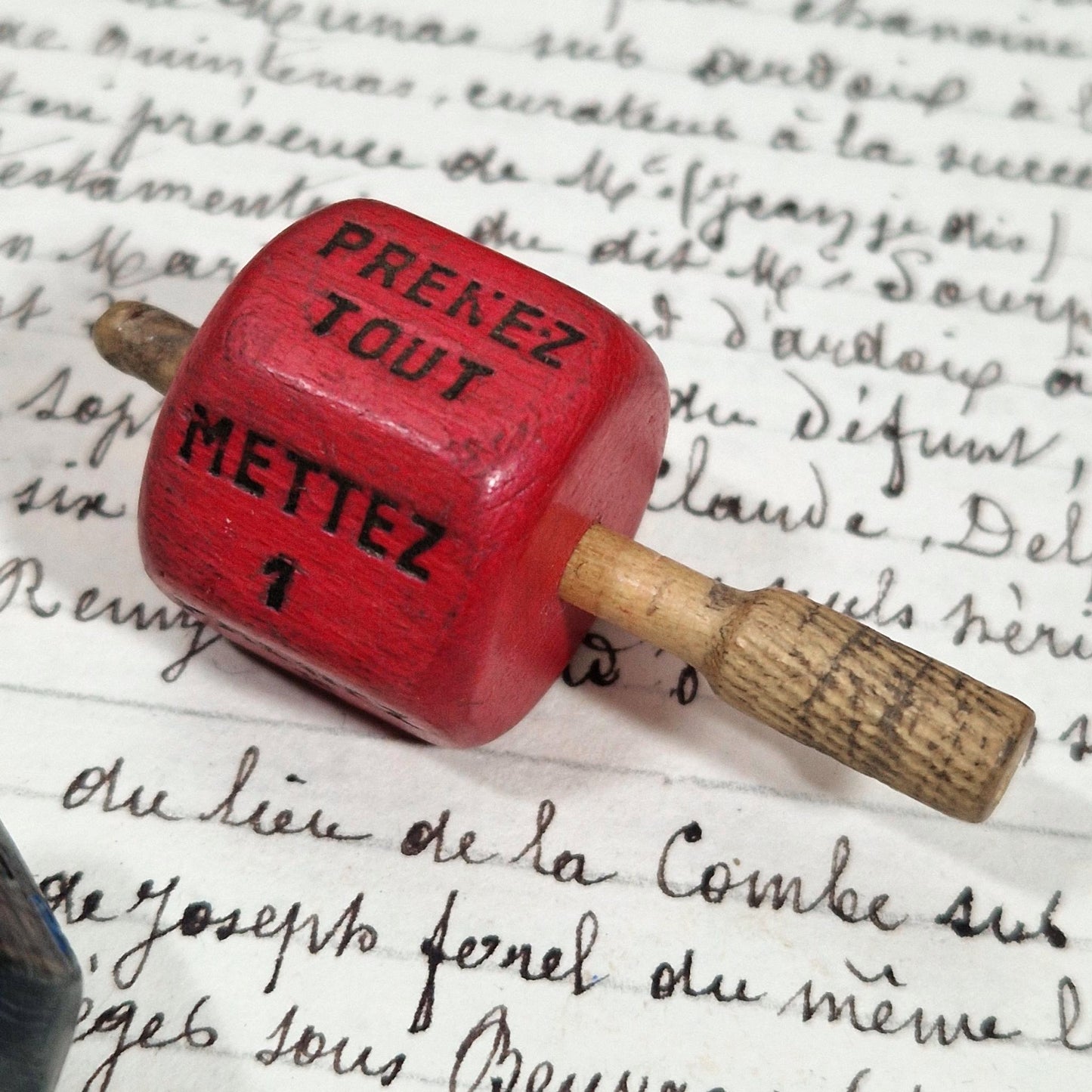 Ancienne « Toupie de comptoir » en bois