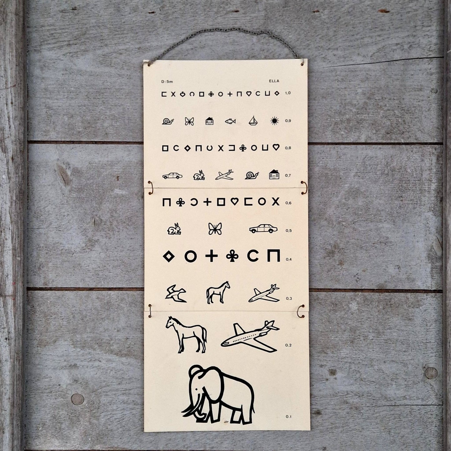 Ancienne échelle optométrique illustrée pour enfants et illettrés