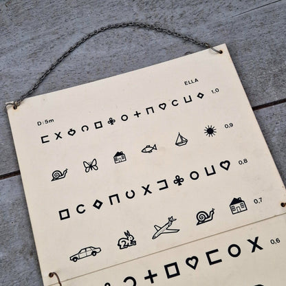Ancienne échelle optométrique illustrée pour enfants et illettrés