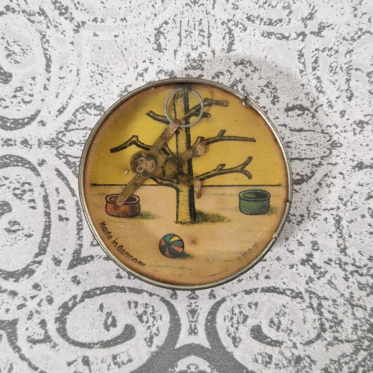 Rare antique skill game "The Monkey with the Ring"