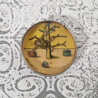 Rare antique skill game "The Monkey with the Ring"