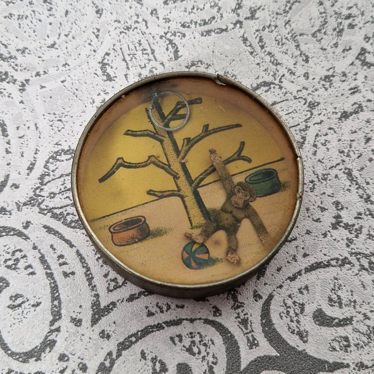 Rare antique skill game "The Monkey with the Ring"