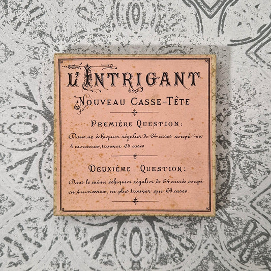 Ancien jeu « L’Intrigant - Nouveau Casse-Tête », vers 1900