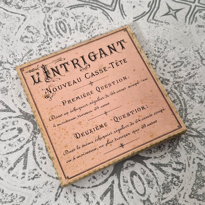 Ancien jeu « L’Intrigant - Nouveau Casse-Tête », vers 1900