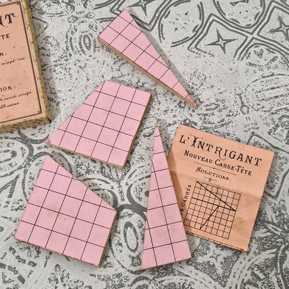 Ancien jeu « L’Intrigant - Nouveau Casse-Tête », vers 1900