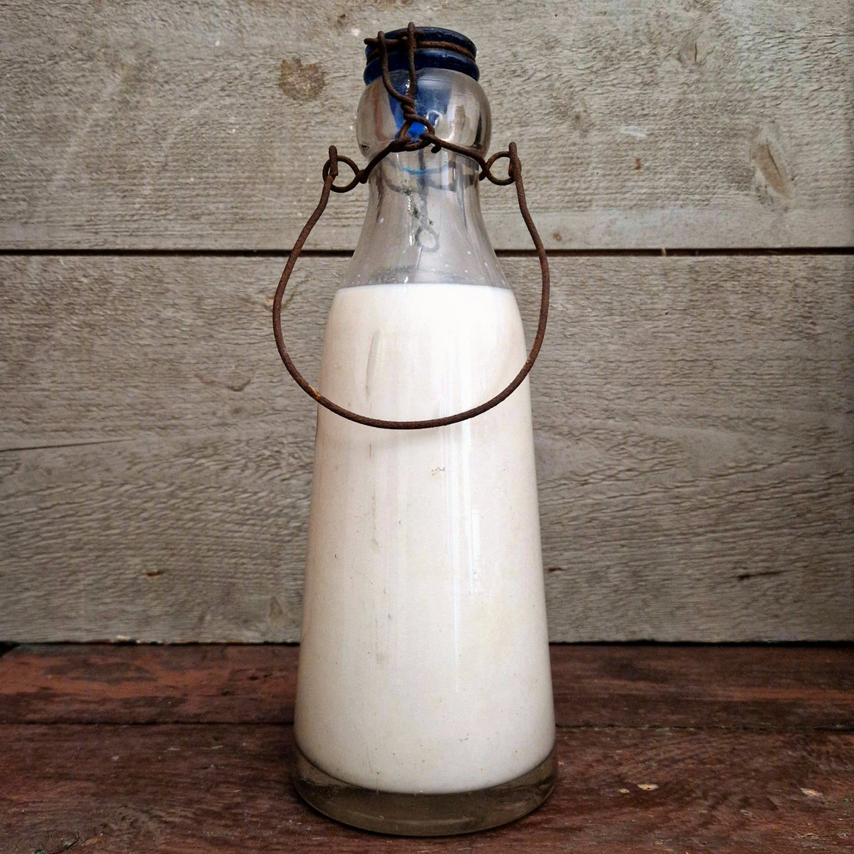 Antique milk bottle "Vaquier, Saint-Maur"