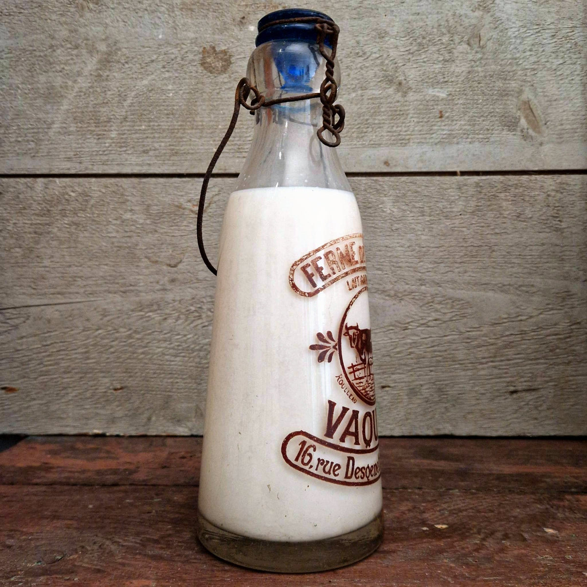 Antique milk bottle "Vaquier, Saint-Maur"