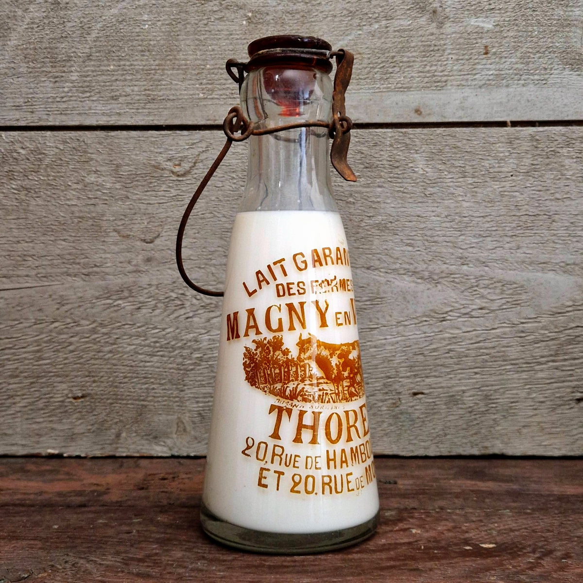 "Thorens – Magny-en-Vexin" milk bottle, early 20th century