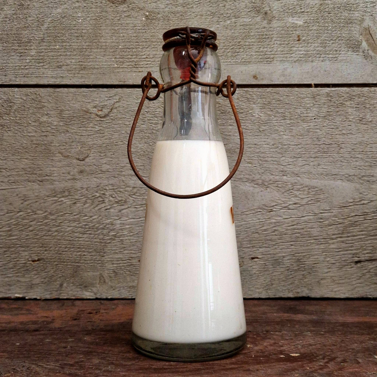 "Thorens – Magny-en-Vexin" milk bottle, early 20th century